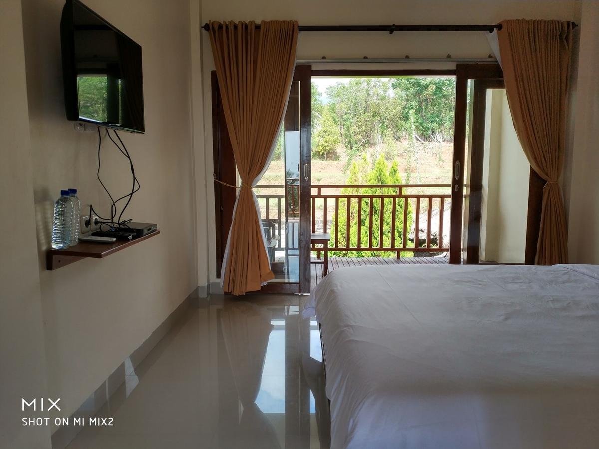 Sinar Rinjani Cottage & Restaurant เซอนารู ภายนอก รูปภาพ